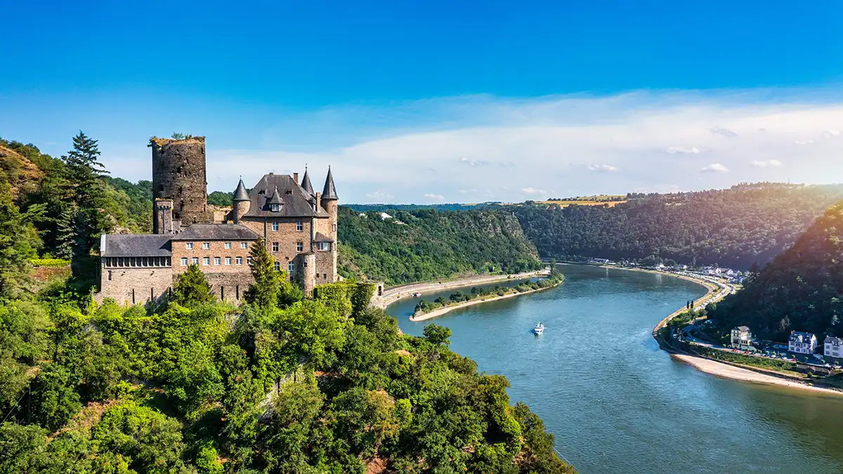 Katz castle and romantic Rhine in summer at sunset, Germany. Katz Castle or Burg Katz is a castle ruin above the St. Goarshausen town in Rhineland-Palatinate region, Germany